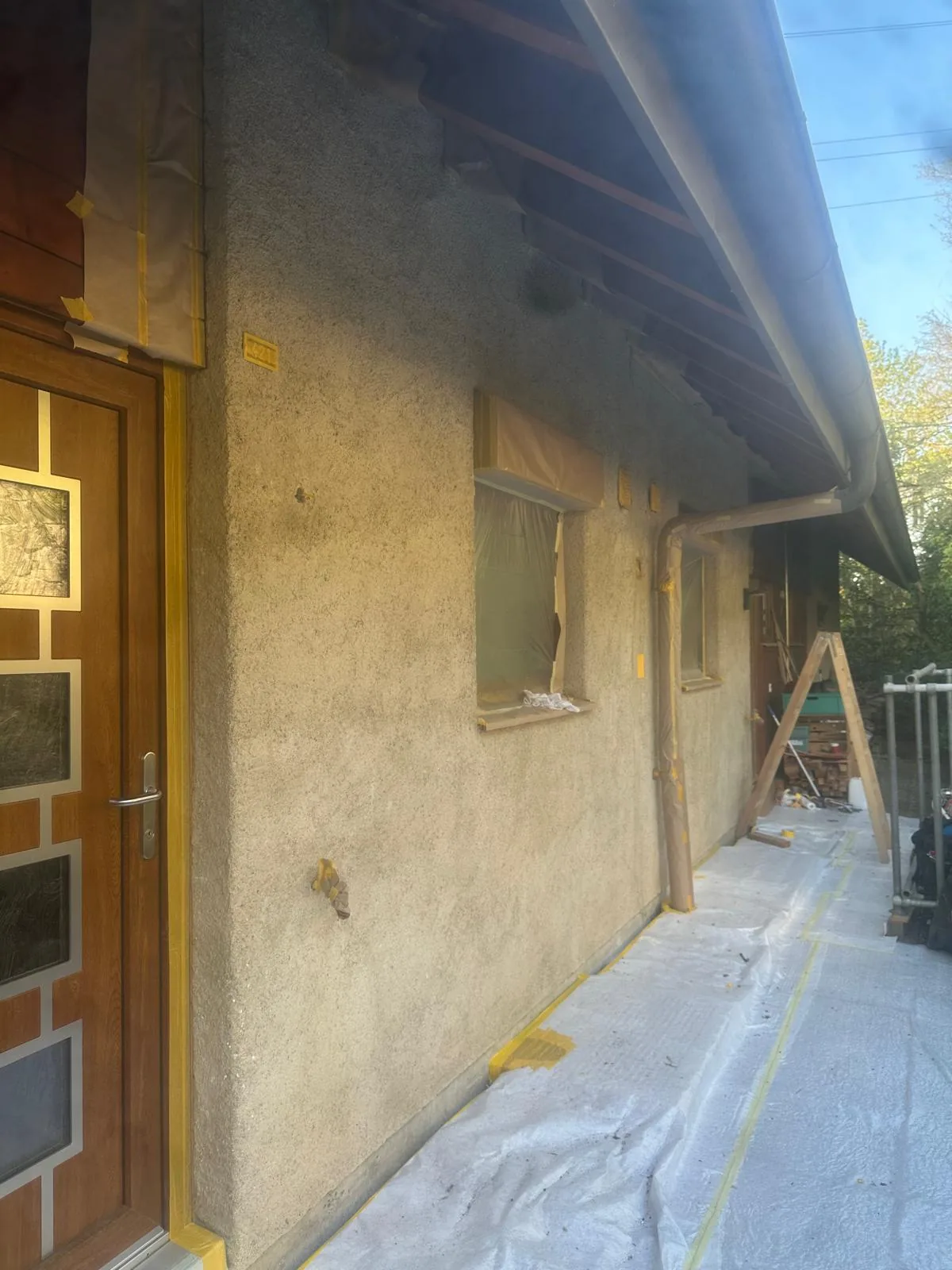 Façade préparée et protégée avant application de la peinture
